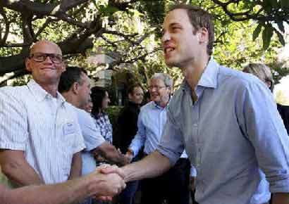 Prince William is congratulated for now having the the rank of Flight Lieutenant