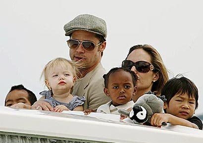 Brad Pitt and Angelina Jolie with their children Brad Pitt and Angelina Jolie with their children