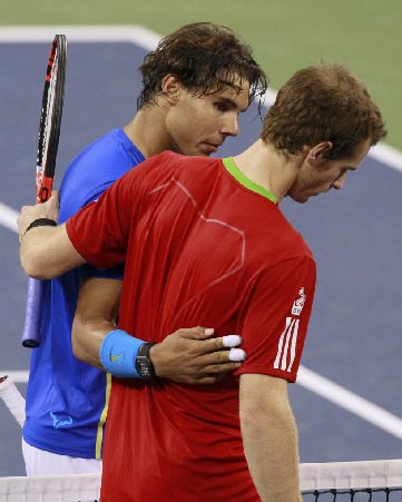 Rafael Nadal of Spain is congratulated by Andy Murray of Britain after Nadal won their semi-final match at the U.S. Open tennis tournament in New York
(Reuters)