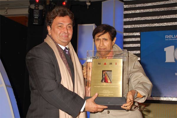 The actor-director-producer was working till his last. His latest project Chargsheet is ready to release and he was planning a extention of his cult hit Hare Rama Hare Krishna.
But there will be no Dev saab, as he was popularly addressed as by friends and fans, to complete them.
In the pic: Rishi Kapoor with Dev Anand at the MAMI awards ceremony
(DNA)