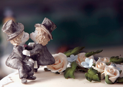 Same sex statues adorn the top of a wedding cake at a wedding specialists store on December 5, 2005 in Birmingham, England.