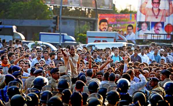 The crowd reacts outside Matoshree in Bandra after Bal Thackeray was announced as having passed away..