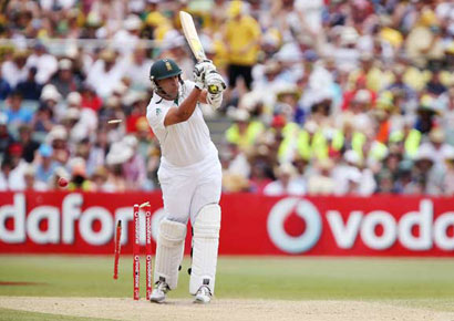 South Africa's Rory Kleinveldt is bowled by Australia's Ben Hilfenhaus during their second cricket Test at Adelaide on Saturday.