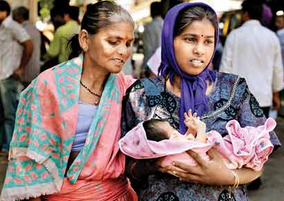 Kavita Shid (right), whose husband is a labourer, fainted in her ninth month. She delivered a baby girl at Sion hospital that later asked the impoverished family to pay Rs4,000 for the blood given to her