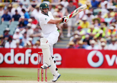 South Africa`s Jacques Kallis hits a boundary off Australia`s Peter Siddle during the third day of the second Test at the Adelaide cricket ground on Saturday.