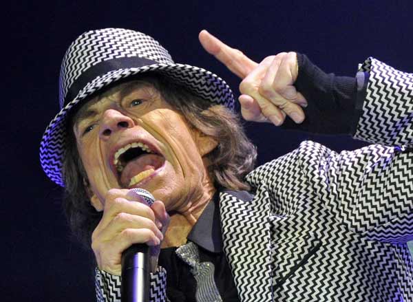 Mick Jagger performs with the Rolling Stones at the O2 Arena in London November 25, 2012. The Stones took to the stage on Sunday after a five-year hiatus to celebrate the golden jubilee of one of the most successful and enduring bands in rock and roll history. Now in their mid-60s to early 70s, lead singer Jagger, guitarists Keith Richards and Ronnie Wood and drummer Charlie Watts were joined by former members Bill Wyman and Mick Taylor for concerts in London and the United States. 