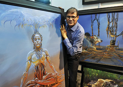 Nagpur-based artist Bijay Biswaal displays his acrylic paintings at the India Art Festival at BKC 