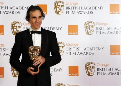 Actor Daniel Day Lewis poses with the award for Best Actor in the awards room at the Orange British Academy Film Awards at the Royal Opera House on February 10, 2008 in London, England.