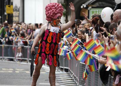 Revellers attend Manchester Pride 2012 in Manchester on August 24, 2012.