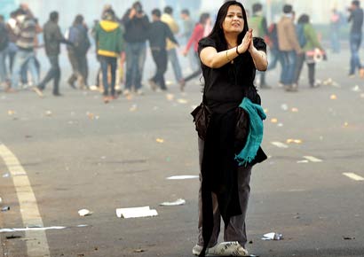 A girl pleads with the police not to use force during a protest at India Gate against the rape of a student in Delhi.