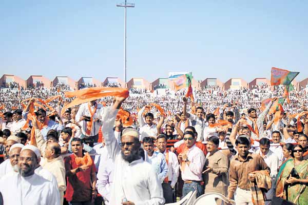 Muslims wave BJP flags as Narendra Modi takes oath at Sardar Patel Stadium in Gujarat 