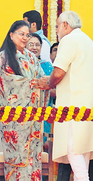 With Vasundhara Raje.