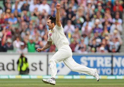 Mitchell Johnson celebrates the dismissal of Sri Lanka's Tillakaratne Dilshan during day three of the second Test between the two countries at Melbourne Cricket Ground on Friday.