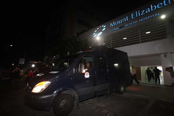 A police van carrying the body of the Indian rape victim leave Mount Elizabeth Hospital for the morgue in Singapore.
(Reuters)