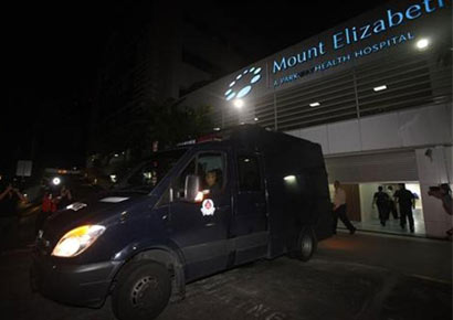 A police van carrying the body of the Delhi rape victim leave Mount Elizabeth Hospital for the morgue in Singapore December 29, 2012.