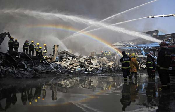 Firefighters try to extinguish a fire at the Hangzhou Yusei Machinery Co.,Ltd in Xiaoshan District in Hangzhou, Zhejiang Province
Photo by: Stringer