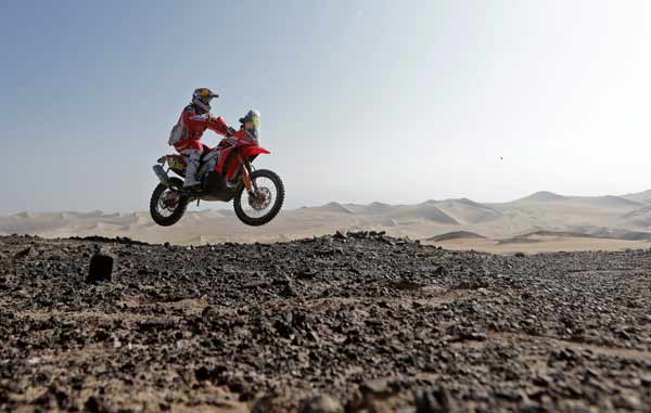 Portugal`s Helder Rodrigues rides his Honda during the 3rd stage of the Dakar Rally 2013 from Pisco to Nazca January 7, 2013.
Photo by Jacky Naegelen/Reuters
(Reuters)