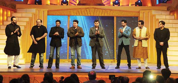 Prabhudheva, Arbaaz Khan, Kabir Khan and Rohit Shetty were among those honoured as part of the Rs 100 crore-revenues club of directors for their individual films. Incidentally, Prabhudheva also picked up an award on behalf of the stunt director of his latest film (who was not present at the venue).
Triumphant: (L-R) Siddharth Roy Kapur, Pritam, Ranbir Kapoor, Anurag Basu, Ileana D’Cruz, Ronnie Screwvala and Shah Rukh Khan at the awards function.
(Pramod Thakur / DNA)