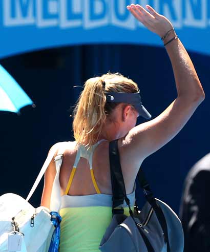 Maria Sharapova of Russia leaves the court after losing her Semifinal match against Na Li of China after their semi-final match of the 2013 Australian Open