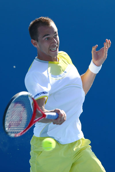 Who's this Rosol?
In one of the biggest upsets in tennis, a non-descript Czech by the name of Lukas Rosol did the unthinkable by beating Rafael Nadal in the second round of Wimbledon last year. The unseeded Rosol won 6-7(9), 6-4, 6-4, 2-6, 6-4. Nadal hasn't played a match since!
(Getty Images) Lukas Rosol of the Czech Republic plays a forehand in his first round match against Jamie Baker of the UK on day two of the 2013 Australian Open on January 15, 2013.