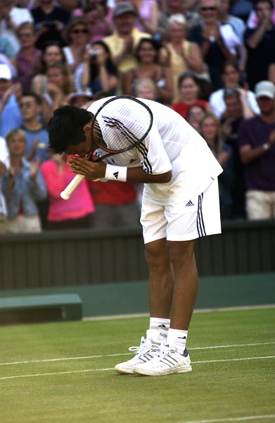 Unseeded Srichaphan humbles 'great' Agassi
Andre Agassi may not have been at the peak of his career but unseeded Paradorn Srichaphan of Thailand ruffled enough feathers by defeating him the second round of Wimbledon in 2002. He beat the third-seeded Agassi 6-4, 7-6, 6-2 in just 1 hour and 47 minutes.
(Getty Images) Paradorn Srichaphan of Thailand after he demolished Andre Agassi at 2002 Wimbledon.