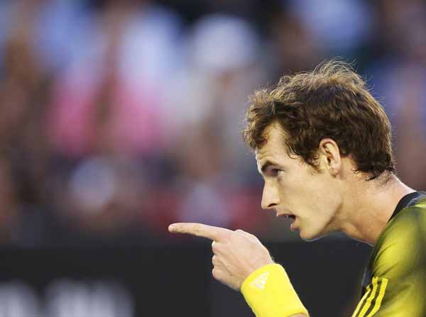 From Andy Murray reacting during his semi-final match to a farmer holding a giant onin, here are January 25's best photos.
Andy Murray of Britain reacts during his men`s singles semi-final match against Roger Federer of Switzerland at the Australian Open tennis tournament in Melbourne.
Photo by Tim Wimborne
(Reuters)