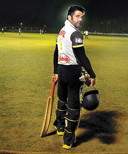 Suniel Shetty heads for the crease.