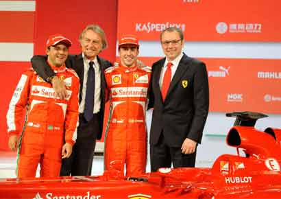 Ferrari boss Luca Cordero di Montezemolo (2nd L) poses with drivers Fernando Alonso (2nd R) of Spain, Felipe Massa of Brazil and  team principal Stefano Domenicali (R) during a presentation of the new Ferrari F138 Formula One car.