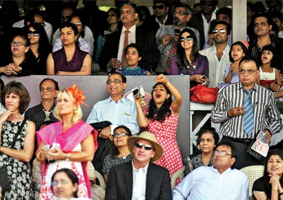 Who said people throng only cricket stadiums in India? As the onlookers' expressions suggest, it was one exciting day at the Mahalaxmi Race Course