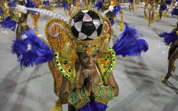A reveller from the Unidos de Vila Maria Samba School takes part in a carnival at Anhembi Sambadrome in Sao Paulo.
Who is King Momo and how is he associated with the carnival?
The carnival gets started when King Momo appears as he is considered to be the king of carnivals in many countries in South America. Every carnival has a tall, fat man who plays the role of King Momo.
(Reuters)