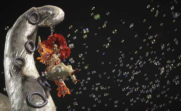 A reveller from the Unidos de Vila Maria Samba School takes part in a carnival at Anhembi Sambadrome in Sao Paulo.
Also read: Tourists visit Goa, enjoy the carnival
(Reuters)