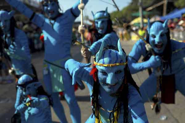 Revellers performs during the "Battle of the Flowers" parade as part of Carnival celebrations in Barranquilla.
(Reuters)