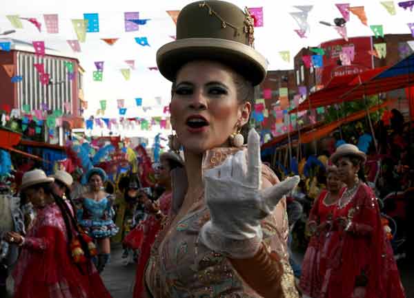 Claudia Fernandez, wife of Bolivia`s vice-president Alvaro Garcia Linera, performs during the carnival parade in Oruro, some 200 km (124 miles) south of La Paz.
(Reuters)