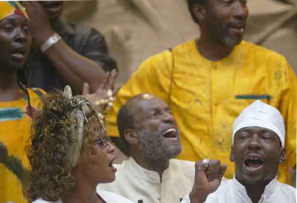 Whitney's daughter, Bobbi watching her mother perform in a concert.