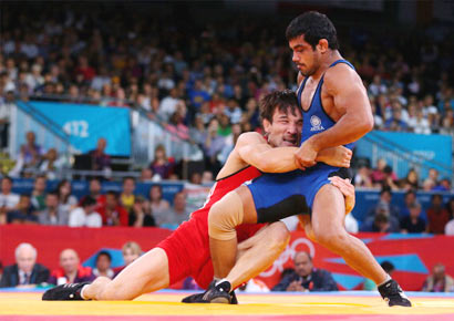 Sushil Kumar in action against Kazakhstan's Akzhurek Tanatarov during the men's freestyle wrestling 66kg semi-final at the London 2012 Olympic Games on August 12, 2012.
