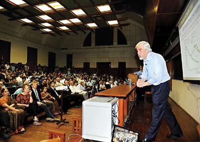 CERN director Rolf-Dieter Heuer engaging the audience during a lecture on the nature of the Higgs-Boson particle, at IISc on Saturday.