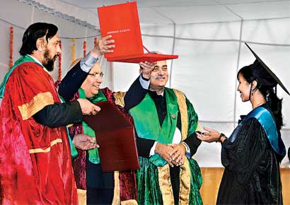 Governor HR Bhardwaj and director-general of Teri, RK Pachauri, laud Mamta for her achievement, at the 47th convocation of UAS in Bangalore on Friday.