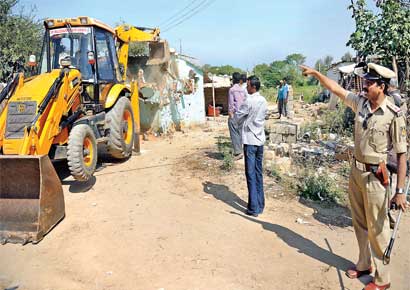 Demolition of encroachments by BMTF.