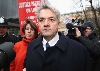 Former Liberal Democrat Cabinet minister Chris Huhne arrives at Southwark Crown Court to be sentenced on Monday in London, England.