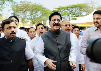 Chief minister Prithviraj Chavan along with opposition leader Vinod Tawde (left) at Vidhan Bhavan during the state assembly session on Tuesday.