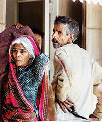 Ram Singh's parents outside the AIIMS mortuary on Tuesday.