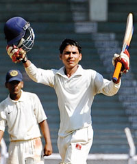 Shoeb Khan celebrates his double century during the Giles Shield final at Brabourne Stadium on Tuesday.