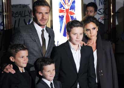 David and Victoria Beckham with sons Romeo, Cruz and Brooklyn at an event in London.