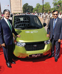 (From left) Anand Mahindra, chairman and managing director of Mahindra and Mahindra and Pawan Goenka, president, automotive and farm equipment sectors, at the launch of Mahindra Reva e2o in New Delhi on Monday.