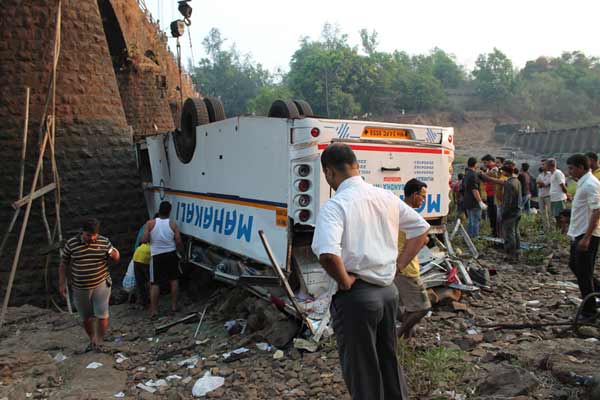 37 dead as bus falls into river