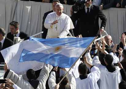 Pope Francis greets the crowds.  