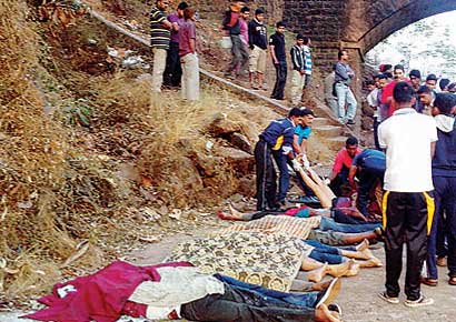 Bodies of victims lie at the accident spot.