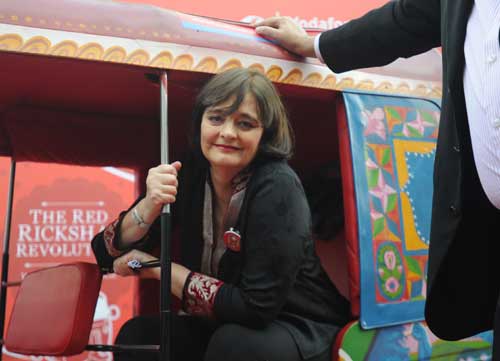 Cherie Blair poses in a rickshaw 