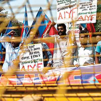 Left activists protest near the Italian embassy in New Delhi.
