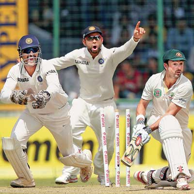 Australian opener Ed Cowan is shocked after R Ashwin (not in pic) bowls him round his legs on Day One of the fourth and final Test in New Delhi on Friday. Australian opener Ed Cowan is shocked after R Ashwin (not in pic) bowls him round his legs on Day One of the fourth and final Test in New Delhi on Friday.